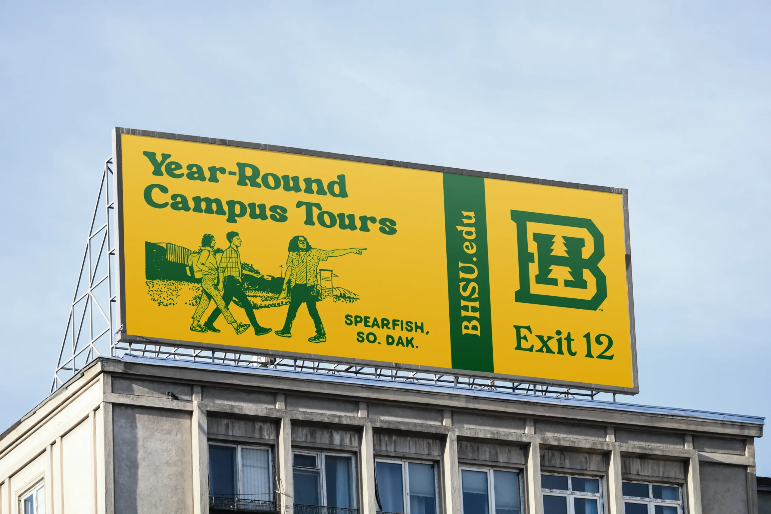 Billboard for BHSU in yellow and green that says Year-Round Campus Tours